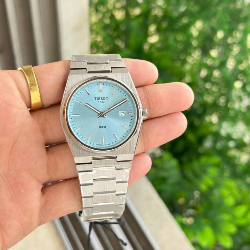 Tissoo_t 1853 Prx Powermatic Quartz  silver Sky blue plan
